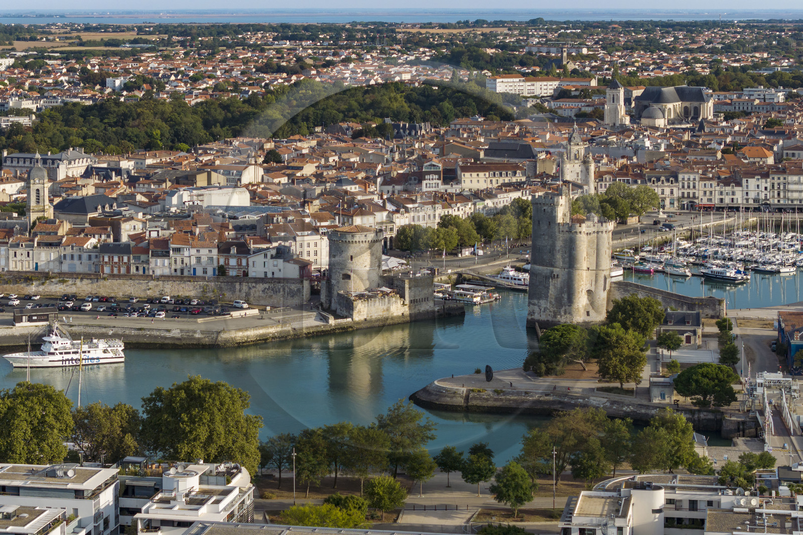 France, Charente Maritime, La Rochelle, the Old Port, Tour de la Chaine left and Tour Saint Nicolas right protect the entrance to the Old Port (aerial view)