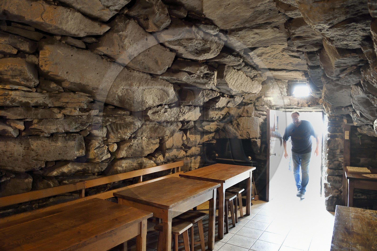 France, Cantal, Parc Naturel Régional des Volcans d'Auvergne (regional nature park of Auvergne volcanoes), Brezons valley, Buron de la Combe de la Saure, a mountain restaurant in Lauze stone in a former sheepfold