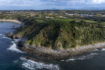 France, Pyrenees Atlantiques, Basque Country coast, Saint-Jean-de-Luz, coastal path on the GR 8, the cape between Erromardie beach and Lafitenia beach in the background on the left (aerial view)
