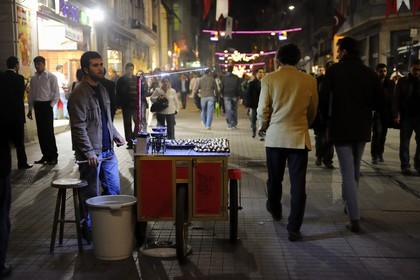 Turkey, Istanbul, Beyoglu district, street vendor of chestnuts on the Istiklal Caddesi street