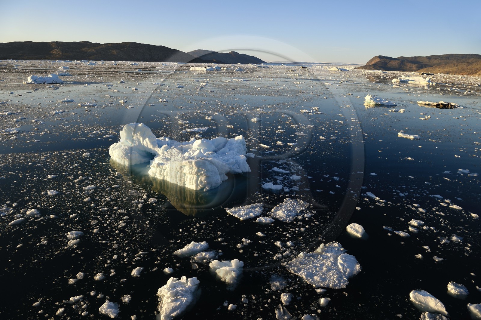 Greenland, west coast, Disko Bay, icebergs in Quervain Bay, the Kangilerngata sermia next to the Eqip Sermia Glacier (Eqi Glacier) in the background