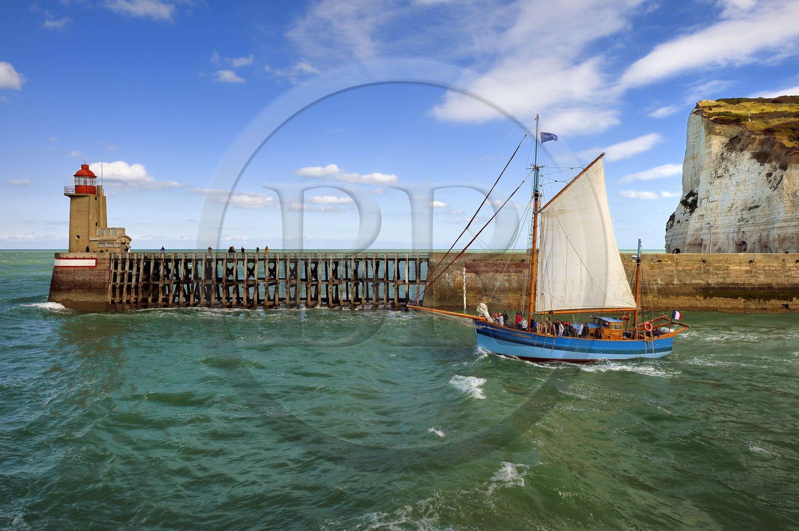 France, Seine Maritime, Pays de Caux, Cote d'Albatre, Fecamp, the old sailing ship Tante Fine leaves the port in front of the Pointe Fagnet lighthouse