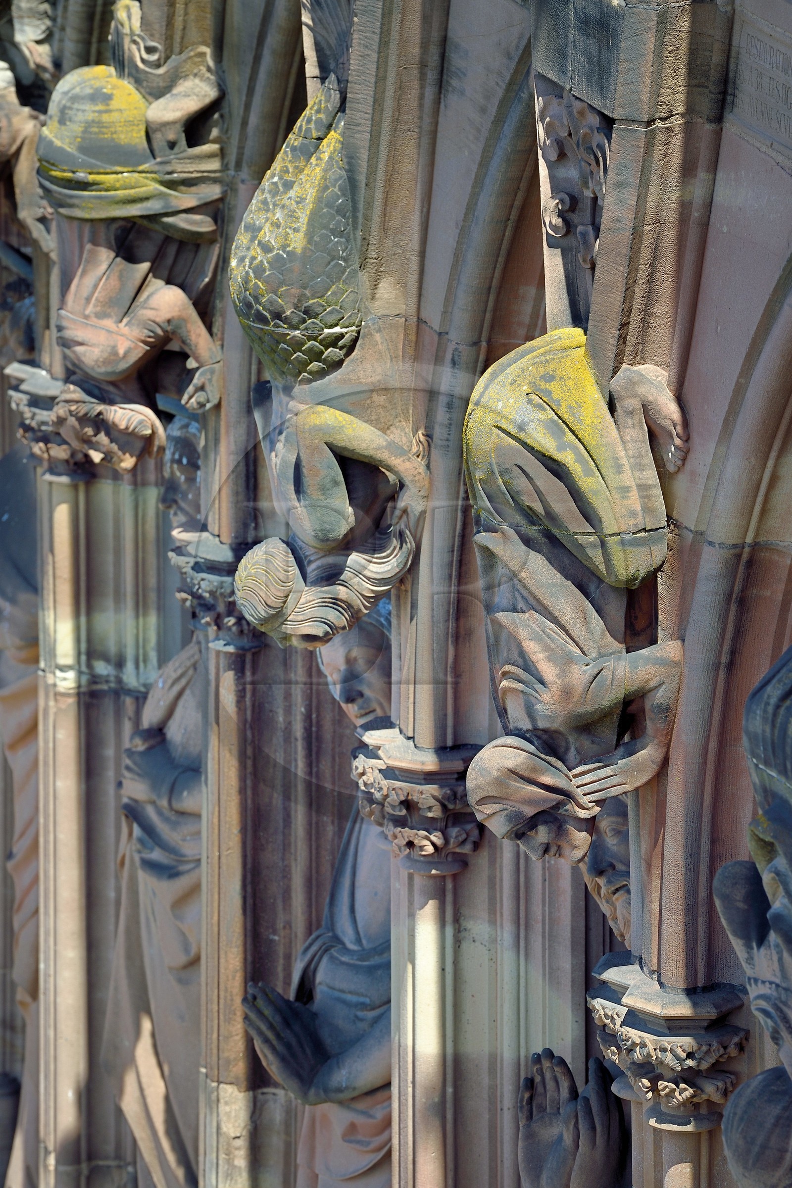 France, Bas Rhin, Strasbourg, old town listed as World Heritage by UNESCO, Notre Dame Cathedral, the western facade, the gallery of the apostles, deformed and chimerical beings on the columns between the apostles