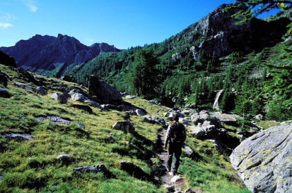France, Alpes Maritimes, Mercantour National Park, Vallee des Merveilles near Fontanalbe, a hiker