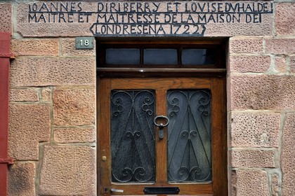 France, Pyrenees Atlantiques, Basque Country, Saint Jean Pied de Port, rue de la Citadelle on the Way of St. James, lintel of house Johan Biriberry and Louise Duhalde master and mistress of the house of Londresena 1722