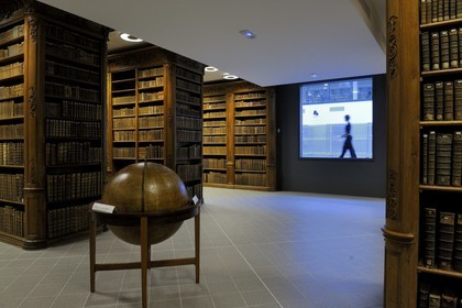 France, Vosges, Epinal, the library Bibliotheque Multimedia Intercommunale (B.M.I) keeps an important collection of early printed books (manuscripts) housed in a wood carved room dated of the 18th century in the heart of a building inaugurated in April 2009