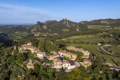France, Vaucluse, Dentelles de Montmirail mountains, the village of Suzette surrounded by vineyards, the Clapis extended by the Grand Montmirail on the left, the Dentelles Sarrasines in the center and the Grand Travers on the right (aerial view)