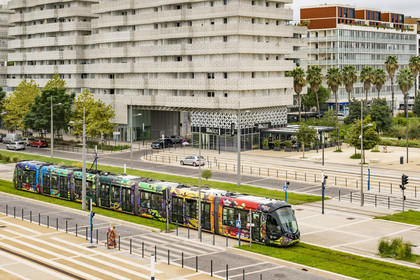 France, Herault, Montpellier, Port Marianne district, tramway on avenue Raymond Dugrand