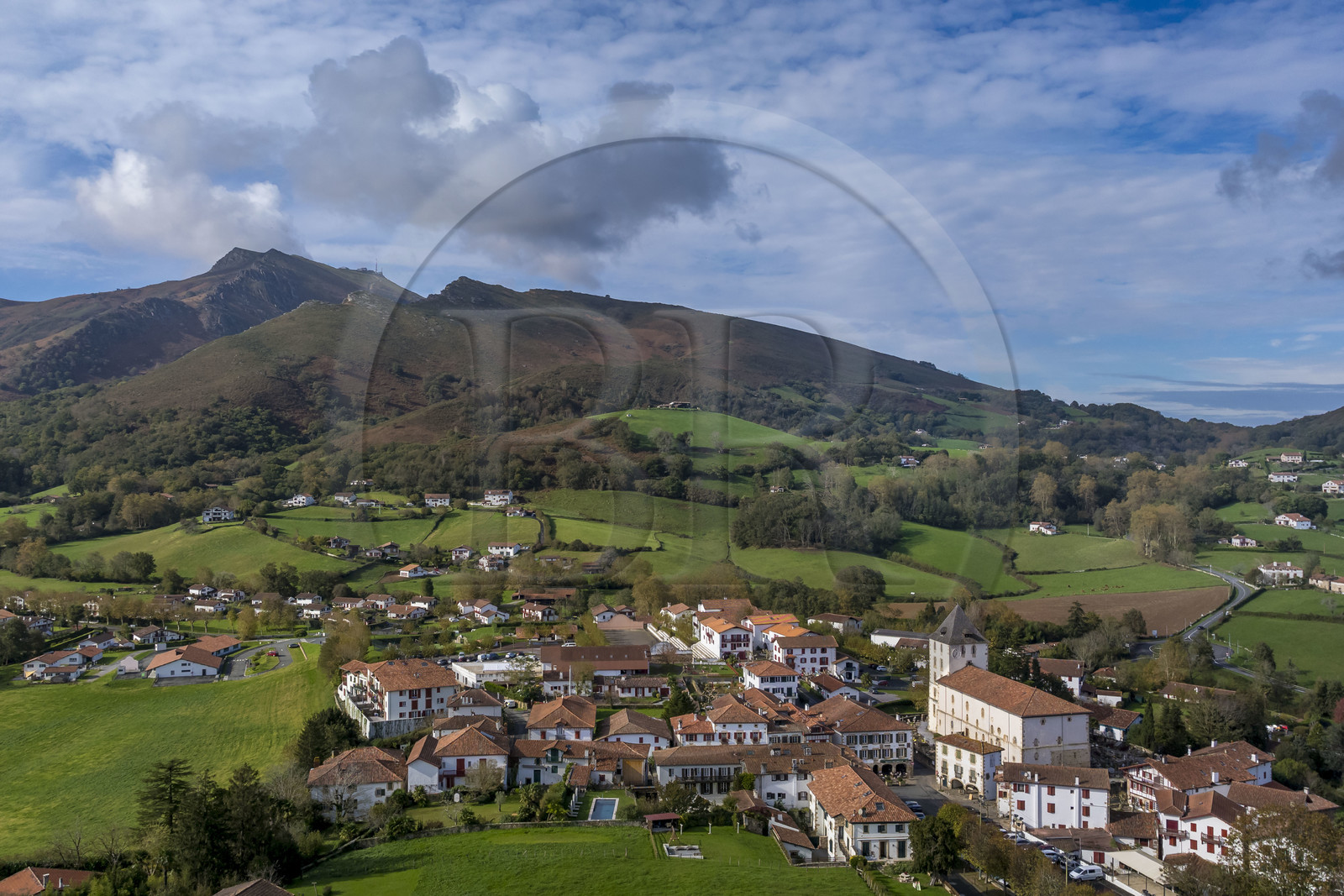 France, Pyrenees Atlantiques, Basque Country, Sare, labelled Les Plus Beaux Villages de France (The Most Beautiful Villages of France), and La Rhune mountain in the background (aerial view)