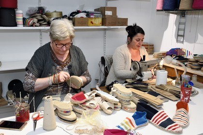 France, Pyrenees Atlantiques, Basque Country, Saint Jean Pied de Port, Albertine Arangois and her daughter Patricia in their shop and craft factory of espadrilles