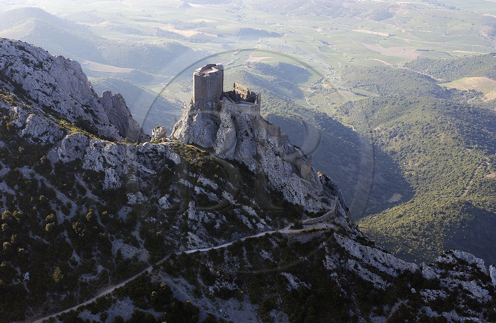 France, Aude, Cathar castle of Queribus overlooking the Fenouilledes in Pyrenees Orientales (aerial view)
