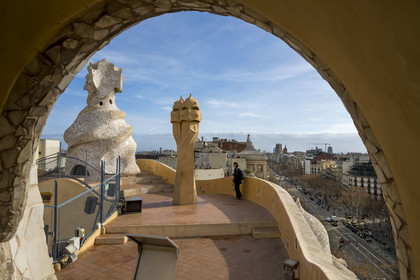 Spain, Catalonia, Barcelona, Eixample district, Passeig de Gracia to the right below, Pedrera or Casa Mila (1905-1910) by the Catalan modernist architect Antoni Gaudi, UNESCO World Heritage site, chimneys and ventilation towers on the roof terrace of the building