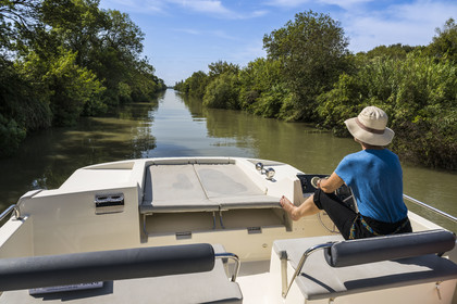 France, Gard, Saint Gilles du Gard, Camargue, Rhone to Sète Canal, navigation of the rental boat Le Boat