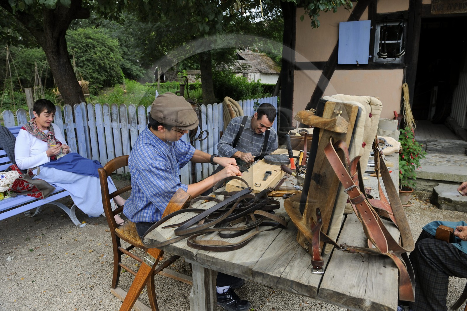 France, Haut Rhin, Ungersheim, Alsace Ecomuseum, saddler craftman checking trapping horse equipment
