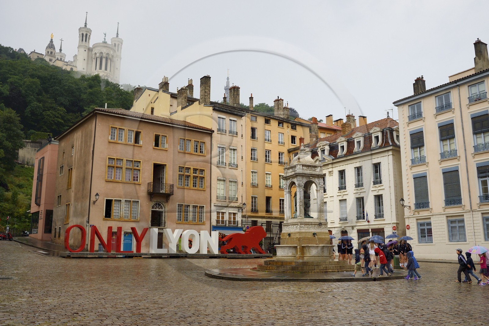 France, Rhone, Lyon, historical site listed as World Heritage by UNESCO, Vieux Lyon (Old Town), in Place St Jean under the Notre Dame de Fourviere Basilica, OnlyLyon is the aglomeration Communication label