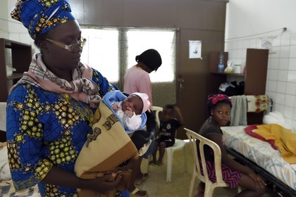 Gabon, Moyen-Ogooue Province, Lambaréné, Albert Schweitzer Hospital, the Maternity Hospital, Ruth less than two hours baby in the arms of her grandmother