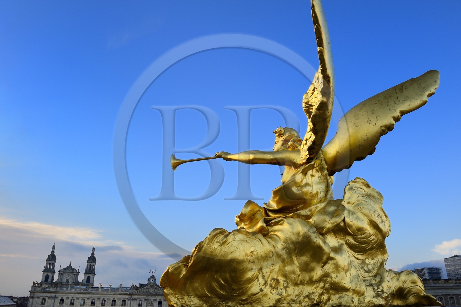 France, Meurthe-et-Moselle, Nancy, Place Stanislas (former Place Royale) built by Stanislas Leszczynski in the 18th century, listed as World Heritage by UNESCO, statue on the Triumph Arch (Here Gate), the City Hall and the Cathedral in the background