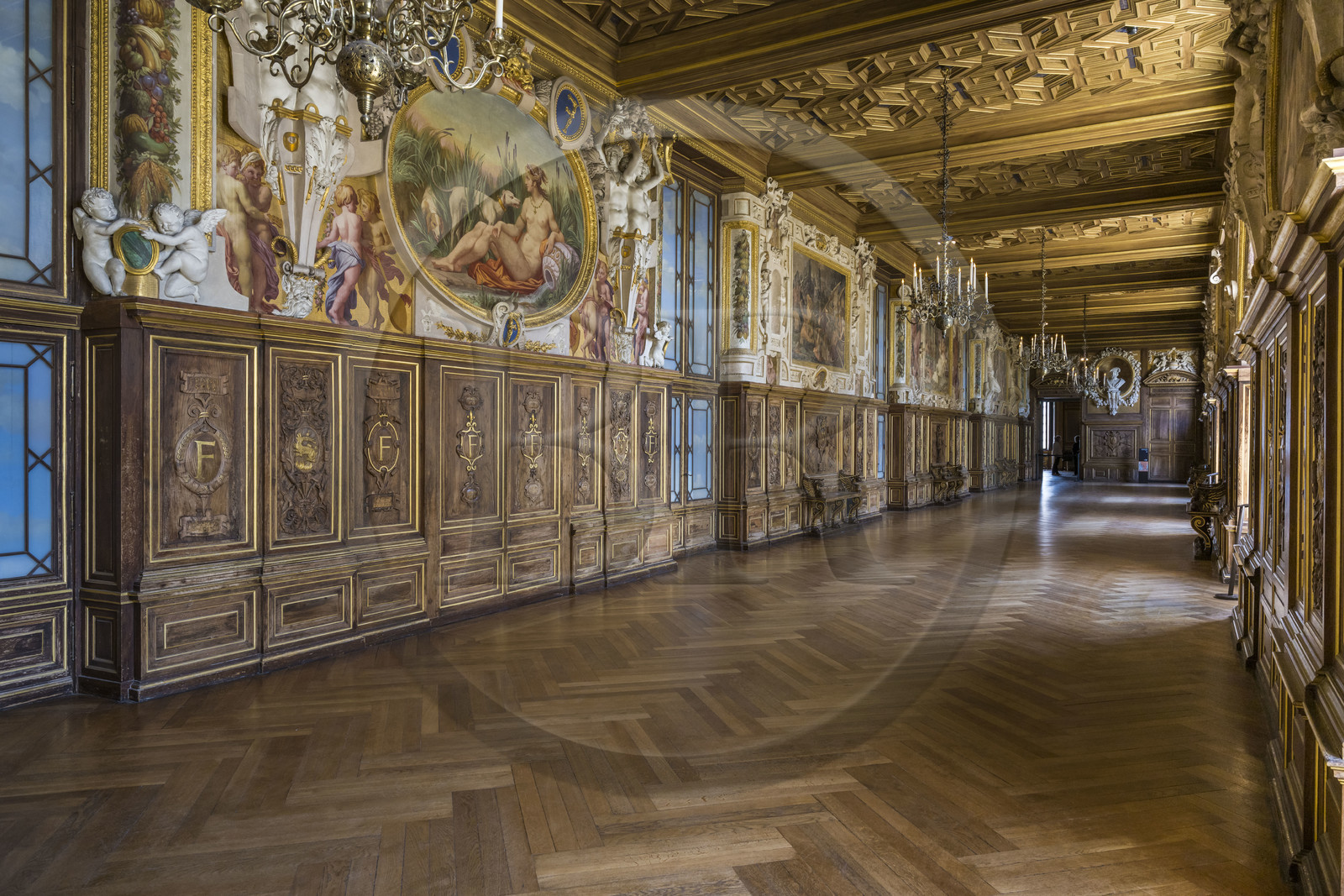 France, Seine-et-Marne, Fontainebleau, castle of Fontainebleau listed as World Heritage by UNESCO, the Francois 1er Gallery built between 1528 and 1530, decorated with paintings, paneling, frescoes and stuccos, carved walnut woodwork and a coffered ceiling
