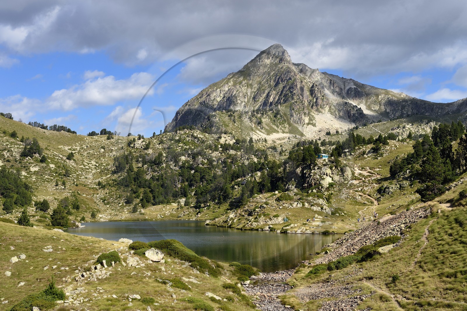 France, Hautes Pyrenees, Saint Lary Soulan and Vielle-Aure, hike on a variant of the GR10 between the Portet pass and the Bastan lakes on the edge of the Neouvielle nature reserve, middle Bastan lake and the Pic de Bastan in the background