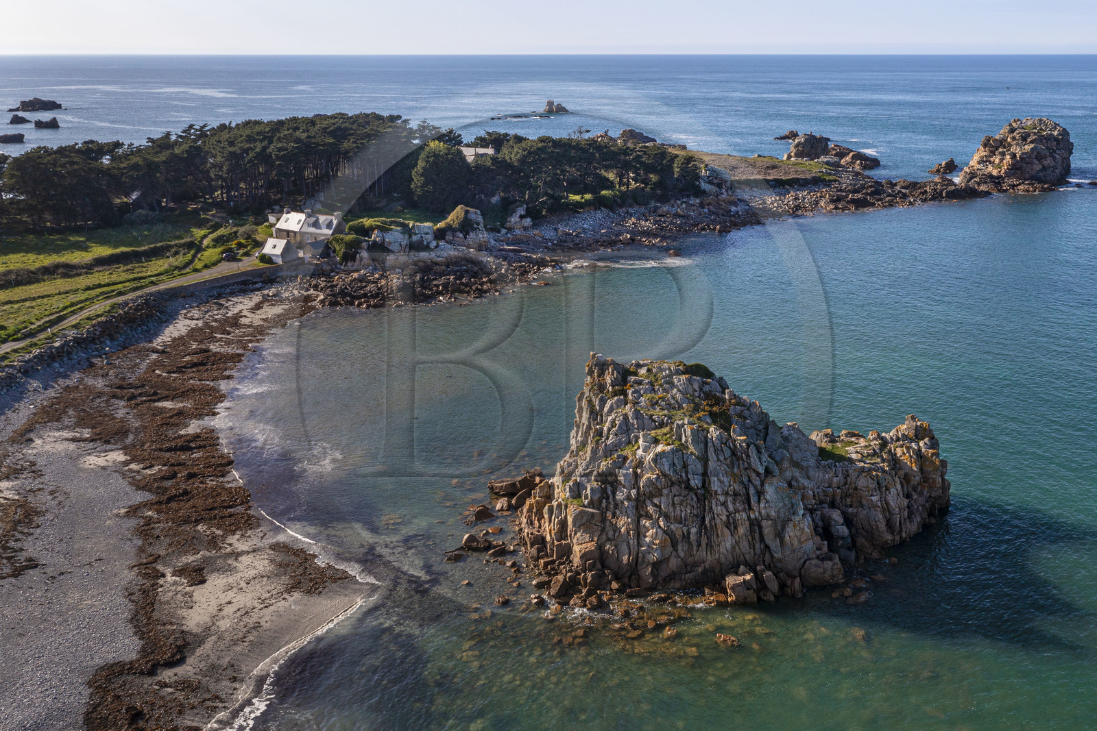 France, Cotes-d'Armor, Cote d'Ajoncs, Plougrescant, rocks at the beach of Porz Hir or Pors-hir and La Pointe du Chateau in the background (aerial view)