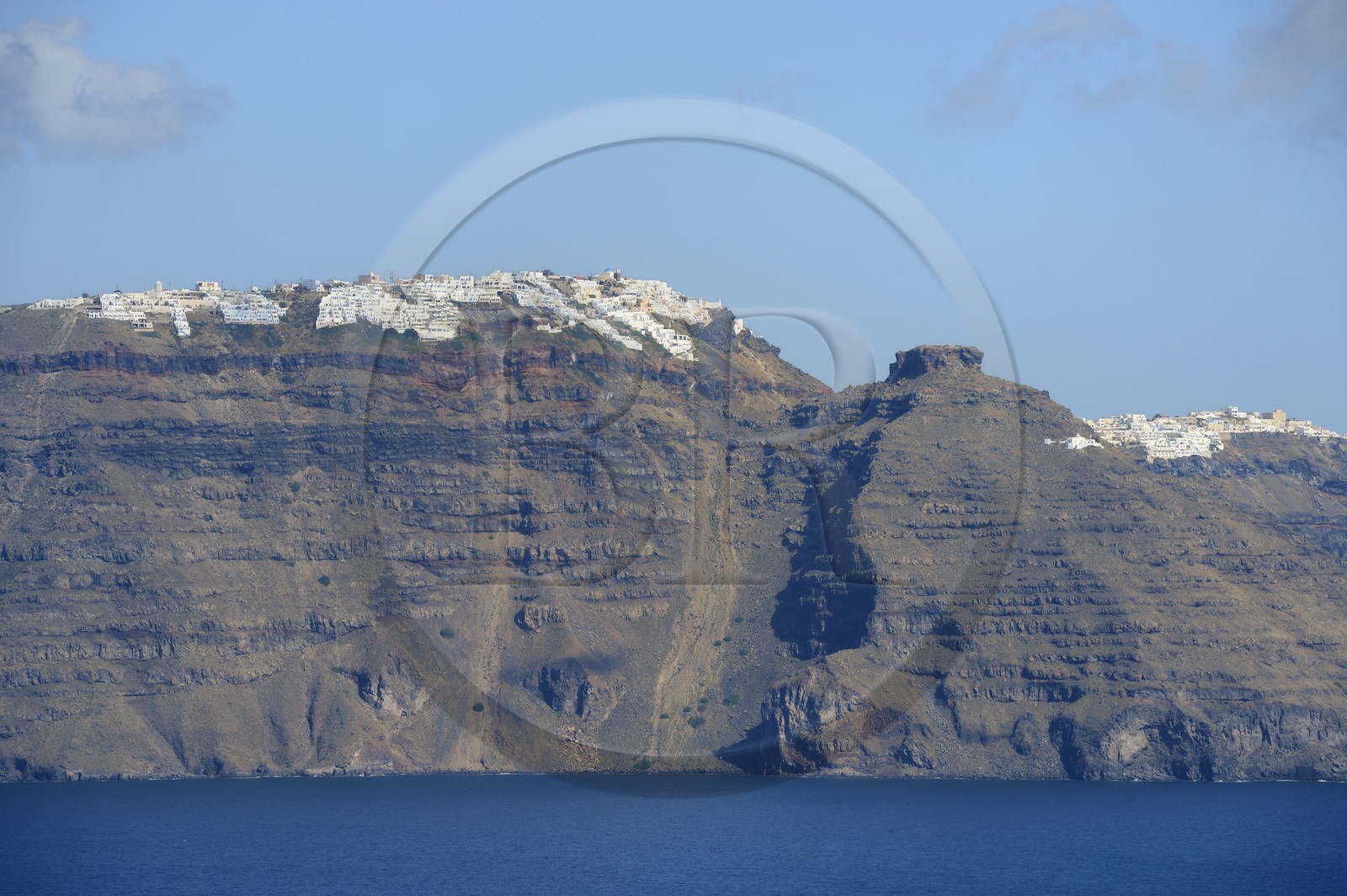 Greece, Cyclades, Aegean Sea, Santorini (Thira or Thera), the villages of Imerovigli (left) and Thira (right) overlooking the caldera