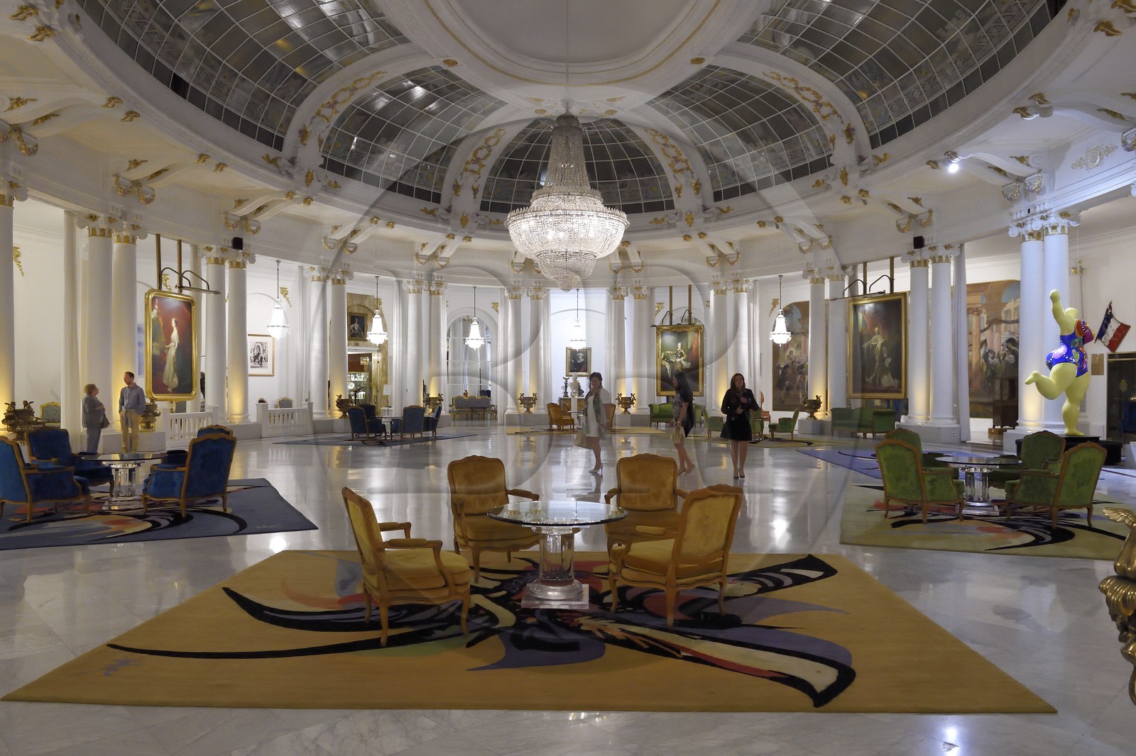France, Alpes-Maritimes, Nice, Negresco Hotel, the inner glass roof and sculpture by Niki de Saint Phalle right