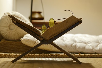 South Africa, Gauteng Province, Johannesburg, residential area of Orchards, Satyagraha House, hotel and museum located in the house that hosted Mohandas Gandhi from 1908 to 1909, built in 1907 by his companion the German architect Hermann Kallenbach, Gandhi's room and his glasses