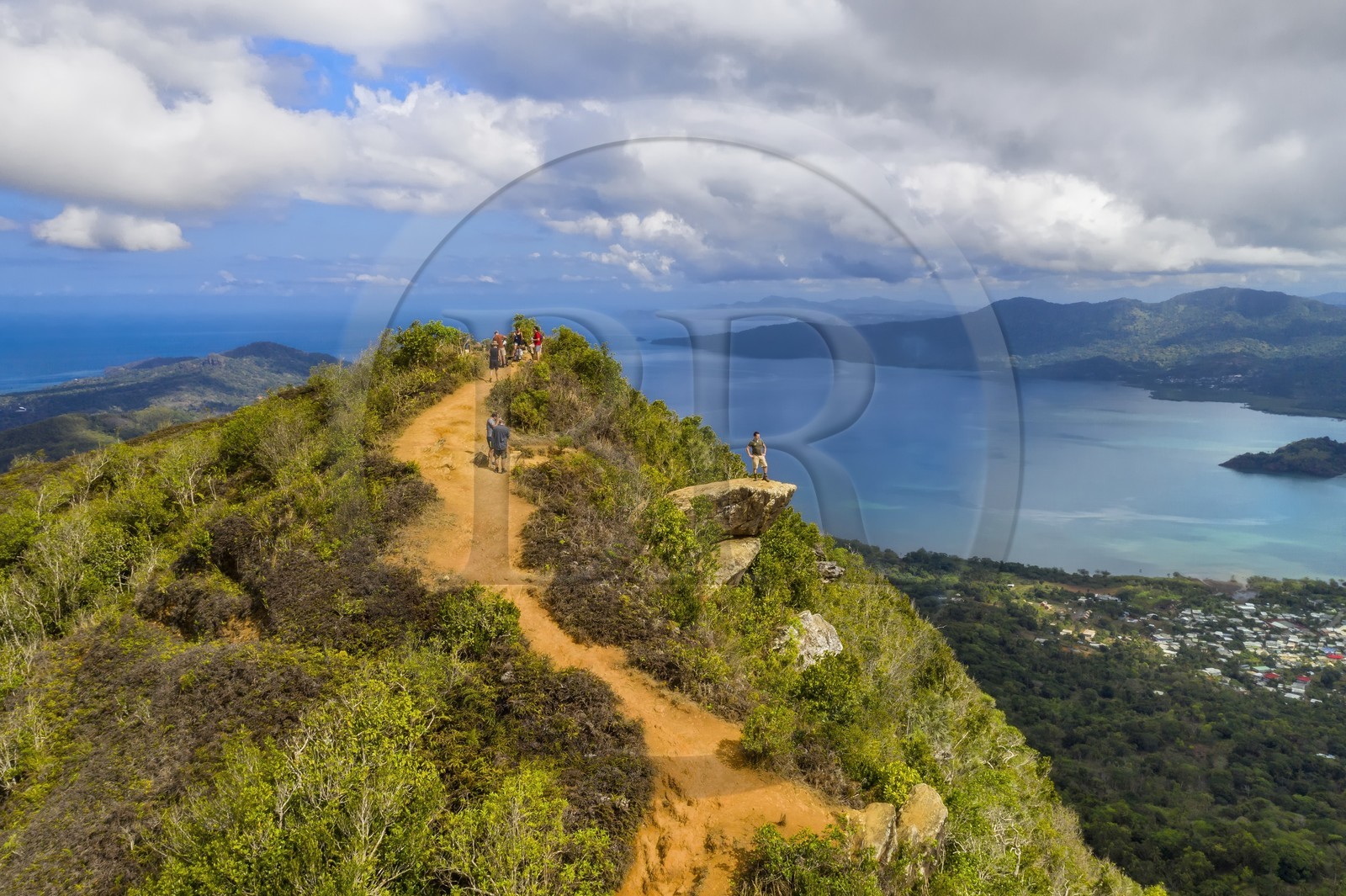 France, Mayotte island (French overseas department), Grande-Terre, Southern Crete Forest Reserve (Reserve Forestiere des Cretes du Sud), hikers at the summit of Mount Choungui (594 meters) and the Bay of Bouéni in the background (aerial view)