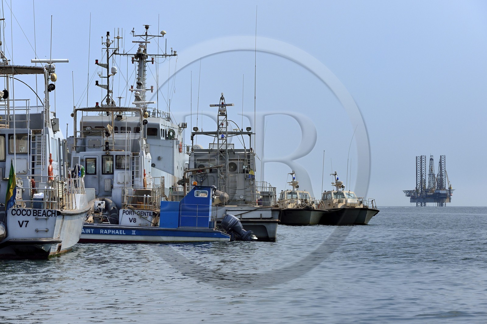 Gabon, Ogooue-Maritime Province, the military port of Port-Gentil and an oil rig in the in the Cape Lopez bay