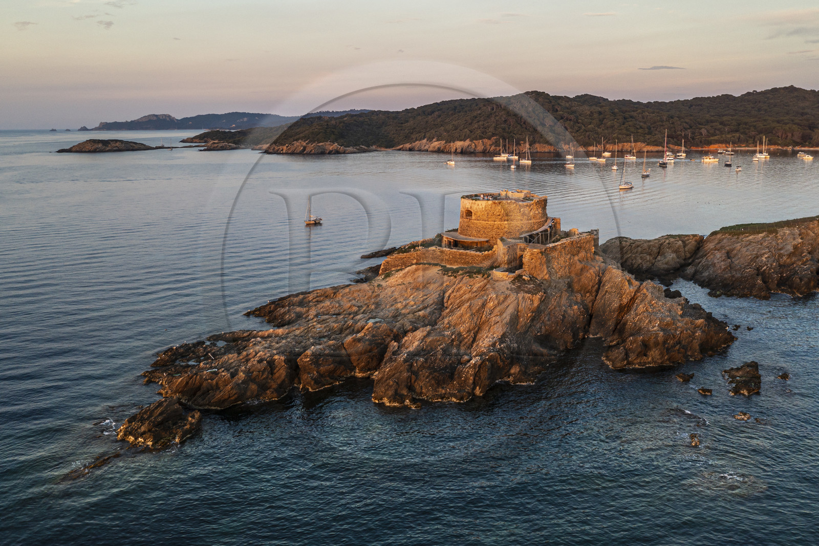 France, Var, Iles d'Hyeres, Parc National de Port Cros (National park of Port Cros), Porquerolles island, the 17th century Fort du Petit Langoustier on its island and Porquerolles in the background (aerial view)