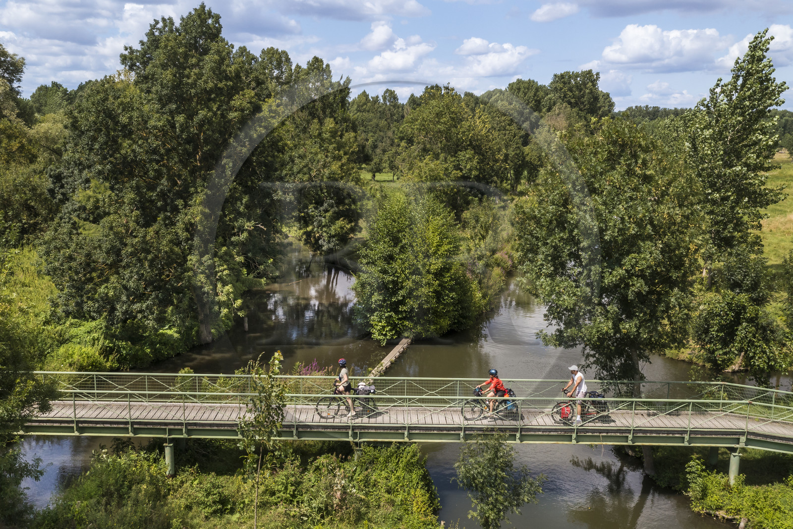 France, Deux-Sèvres, le Marais Poitevin, Green Venice, Sansais, bicycle journey along the Sevre Niortaise River banks on the Vélo Francette cycle path, passage of a footbridge (aerial view)