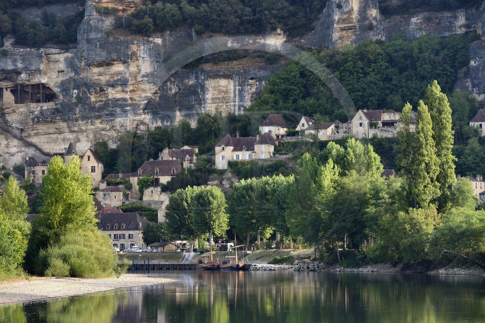 France, Dordogne, Perigord Noir, Dordogne Valley, La Roque Gageac, labelled Les Plus Beaux Villages de France (The Most Beautiful Villages of France), gabares (flat-bottomed boats) in the village port