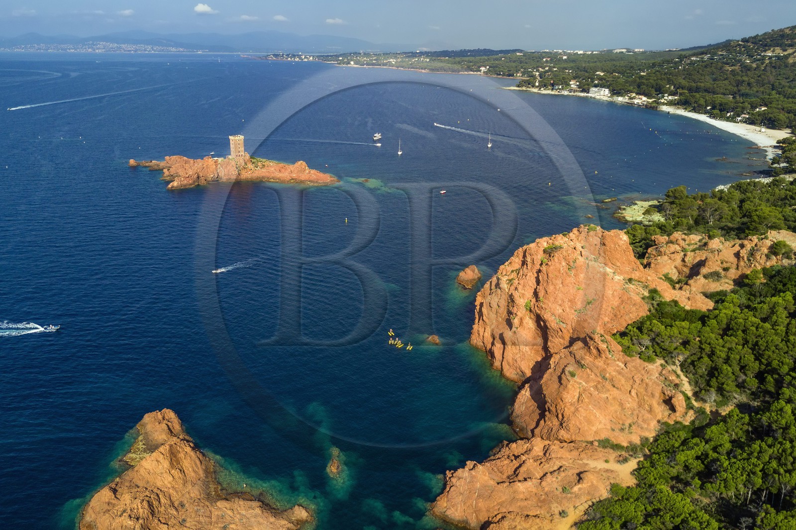 France, Var, Agay area next to Saint-Raphael, Massif de l'Esterel (Esterel Massif), the Corniche d'Or, the ile d'Or island tower next to the Dramont cape and the August 15 1944 landing beach of Provence in the background right (aerial view)
