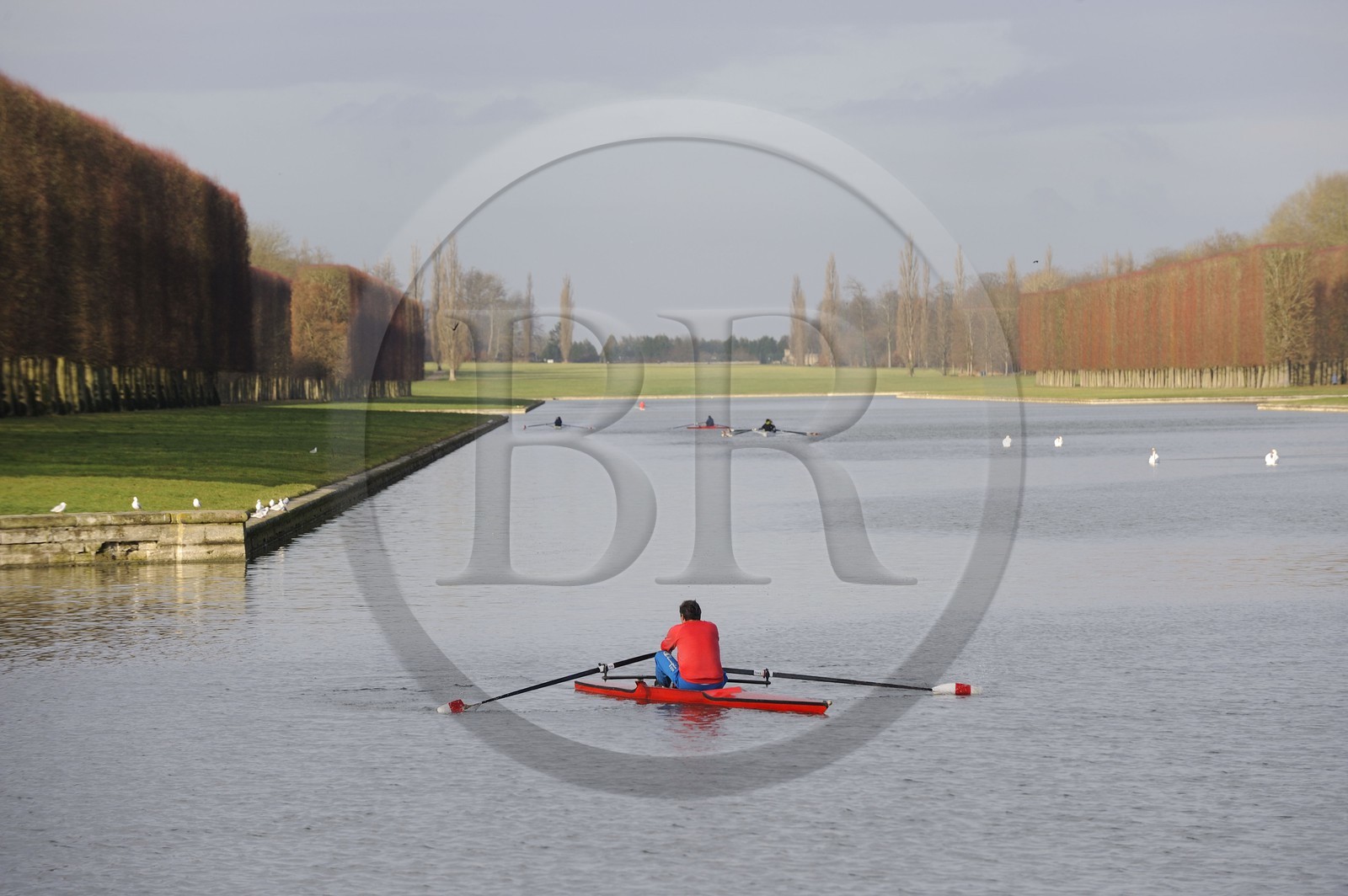 France, Yvelines, parc du Chateau de Versailles, listed as World Heritage by UNESCO, small boats on the Grand Canal in Autumn