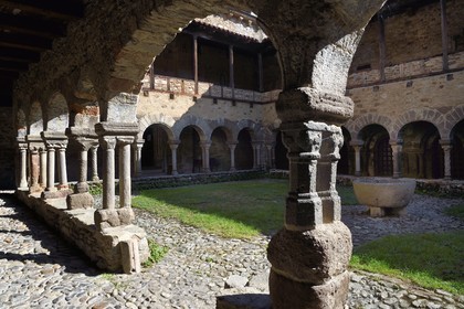 France, Haute Loire, Lavaudieu, labelled Les Plus Beaux Villages de France (The Most Beautiful Villages of France), the former Saint Andre (St Andrew) abbey church in Auvergne Romanesque style, the cloister