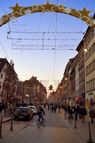 France, Bas Rhin, Strasbourg, old town listed as World Heritage by UNESCO, the large arch - Strasbourg, Capital of Christmas - located at the entrance of the rue du Vieux Marché aux Poissons