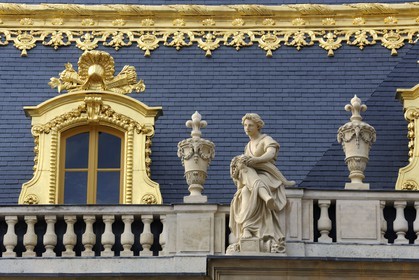 France, Yvelines, Chateau de Versailles, listed as World Heritage by UNESCO, statue on the roof of a building from the Cour de Marbre (Marble Courtyard) renovated in 2008