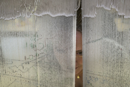 France, Herault, Lodève, Manufacture de la Savonnerie (Savonnerie manufactory) unique annex of the National Carpet Factory of the Savonnerie des Gobelins in Paris, work of a weaver on a loom