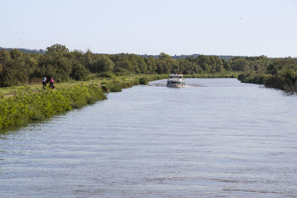 France, Gard, the Petite Camargue, Vauvert, navigation of a pleasure boat on the Rhone to Sète Canal at Gallician