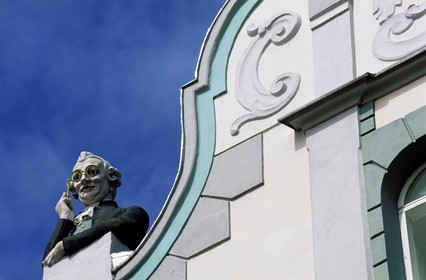 Estonia (Baltic States), Harju Region, Tallinn, European Capital of Culture 2011, House of the Peeping Tom which observes the girls passing in the Pikk street