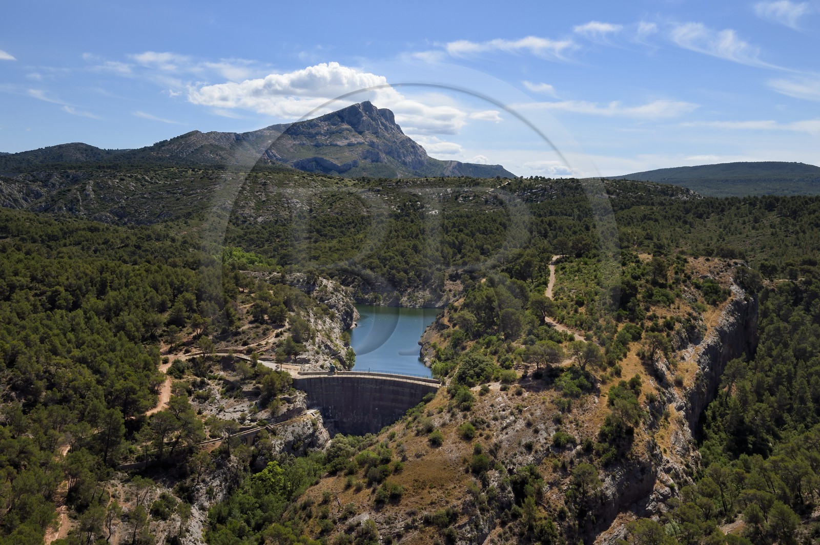 France, Bouches du Rhone, Aix en Provence, hiking on GR 2013, the Zola dam (Cézanne painted the series of Bathers) and the Montagne Sainte Victoire in the background