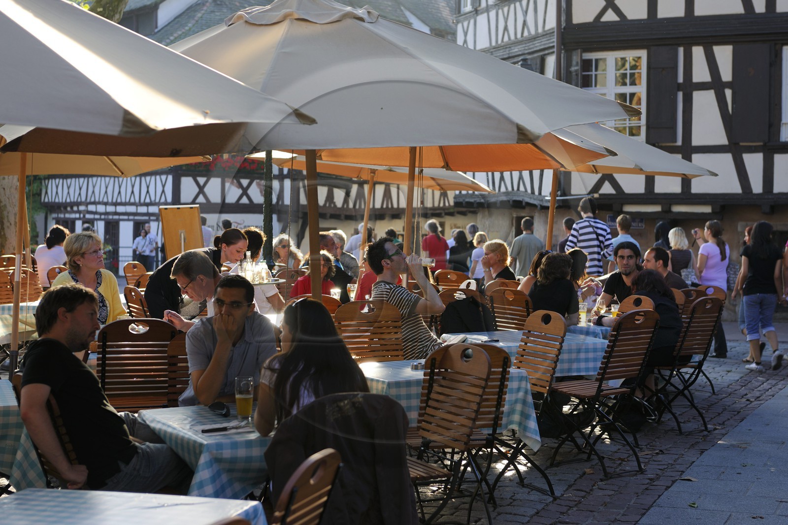 France, Bas Rhin, Strasbourg, old town listed as World Heritage by UNESCO, la Petite France District, terrace of restaurant on place Benjamin Zix
