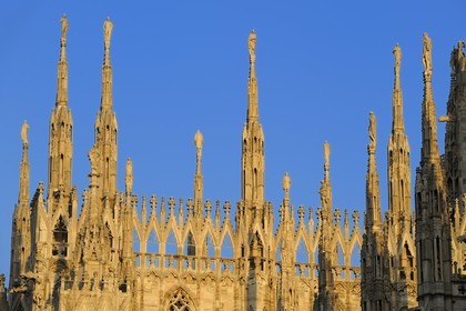 Italy, Lombardy, Milan, the Duomo in the historical center, cathedral in Gothic Flamboyant style, spires topped by statues