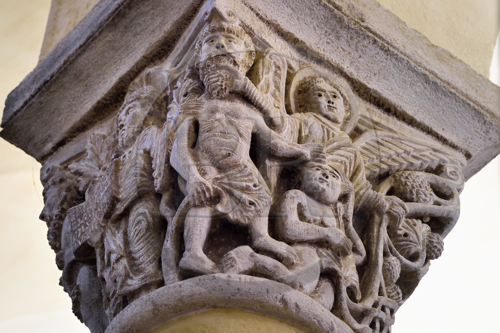 France, Puy de Dome, Clermont Ferrand, Notre-Dame-du-Port basilica in Auvergne Romanesque style, listed as a UNESCO World Heritage Site under the Routes of Saint-Jacques-de-Compostelle in France, choir capital representing Adam and Eve driven out of earthly Paradise