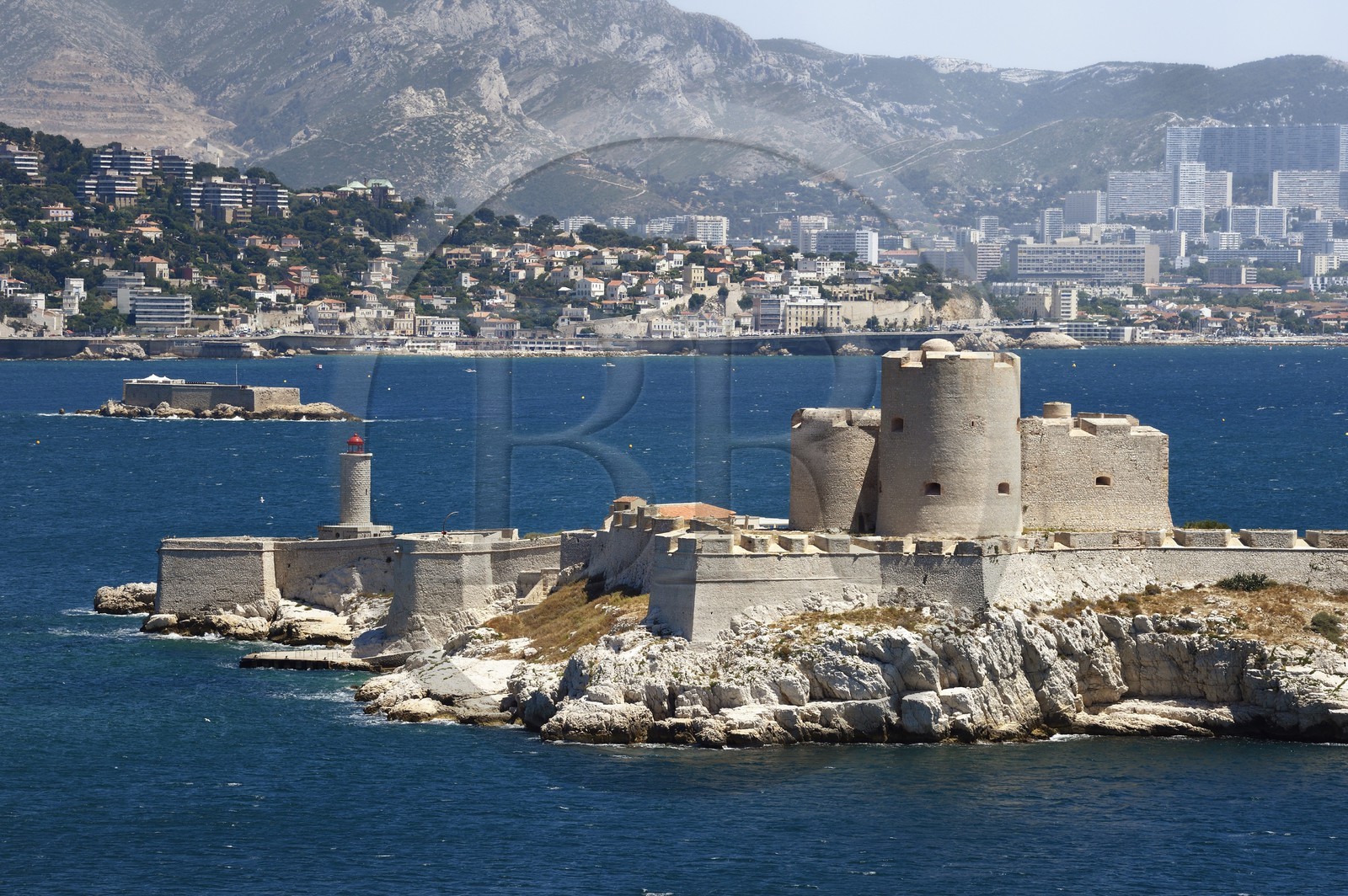 France, Bouches du Rhone, Marseille, Calanques National Park, archipelago of Frioul islands, the Chateau d'If, the little Degaby island with its fort and the city of Marseille in the background