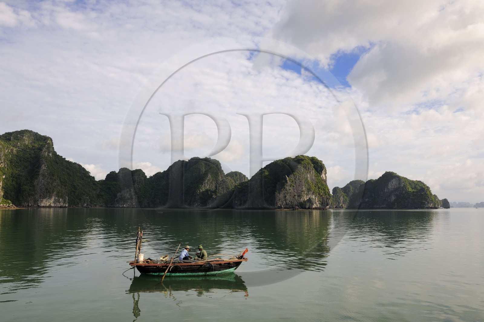Vietnam, Quang Ninh Province, Halong Bay, listed as World Heritage by UNESCO, fishing boat