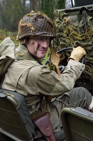 France, Eure, Sainte Colombe prés Vernon, Allied Reconstitution Group (US World War 2 and french Maquis historical reconstruction Association), reenactor Xavier Boucher in uniform of the 101st US Airborne Division