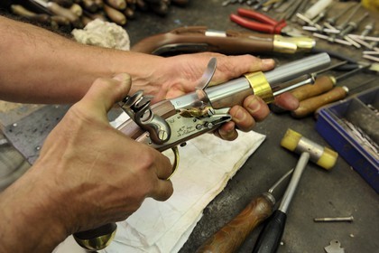 Italy, Lombardy, province of Brescia, Gardone Val Trompia, Davide Pedersoli & C manufacturer specialized in the production of historical muzzleloading guns, final assembly of a pistol