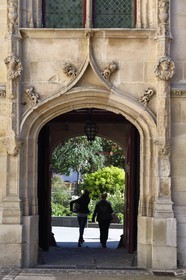 France, Seine Maritime, Rouen, place de la Pucelle, Hôtel de Bourgtheroulde was built in the first half of the sixteenth century by Guillaume Le Roux and presents the joint influences of Gothic and Renaissance style, Louis XII style portal with an antique brace and medallion