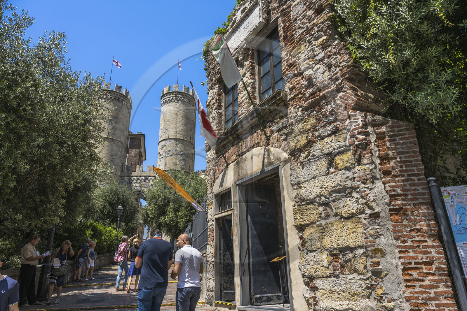 Italy, Liguria, Genoa, the Christopher Columbus House Museum, an 18th century reconstruction of the original building, the Porta Soprana (Towers of Sant'Andrea) and the Ramparts of Barbarossa in the background